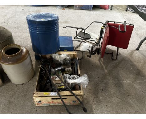 A box containing fire tongs, various old tools, shovel, angle brackets etc, A blue cash box, a circular blue tin and various 