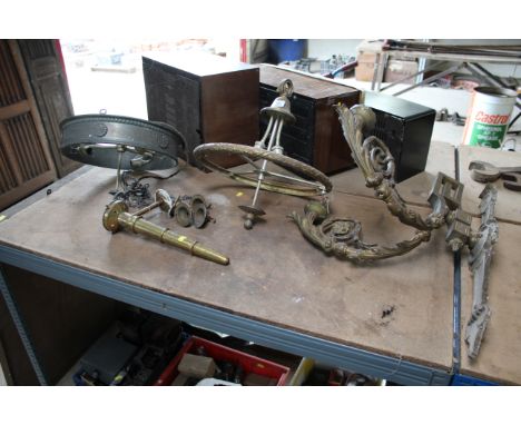 A large ornate twin branch brass wall light fitting, another small brass wall light fitting and two hanging light fittings