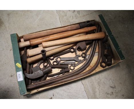 A quantity of bed spanners, five hammer heads, ten as new hammer handles and four copper pipe stretchers