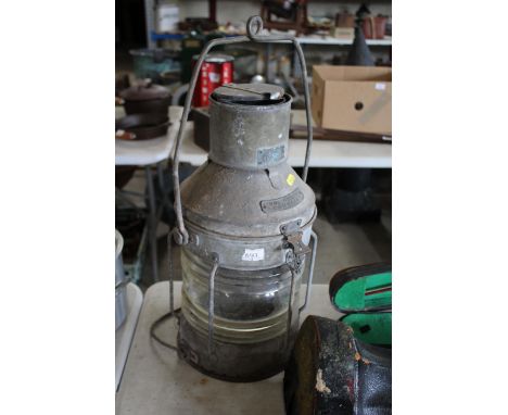 A ships lantern with name plate to "Not Under Command"