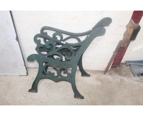 A pair of ornate bench ends