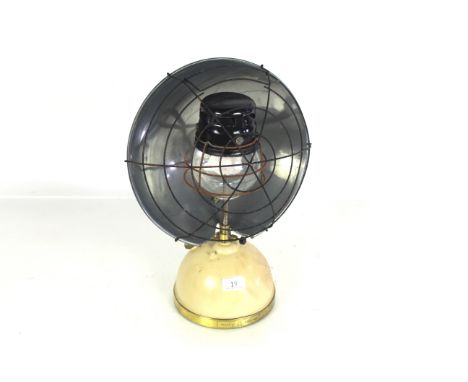 A Tilley bowl lamp / heater with a cream base