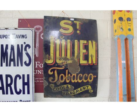A "St. Julian Tobacco" enamel sign approx. 36" x 24"
