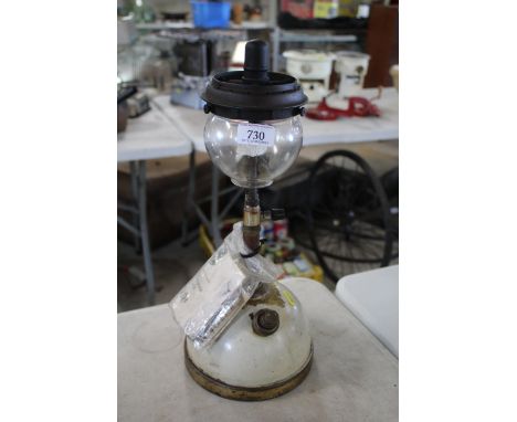 A Tilley lamp with glass shade &amp; paperwork relating to a Relum pressure lantern