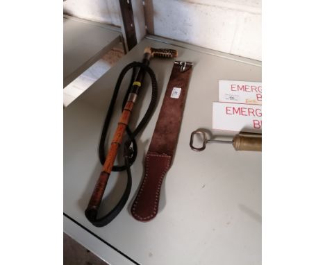 *UPDATED DISCRIPTION* A vintage riding whip with stage grip and a leather strop