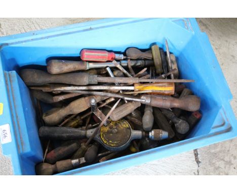 A box of various hand tools, screwdrivers, hand brace etc.