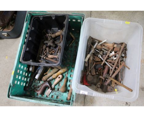 Three boxes containing various taps, small tools, metal rods etc.