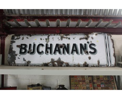A large enamel sign, named to "Buchanan's" AF, approx. 66" x 22"