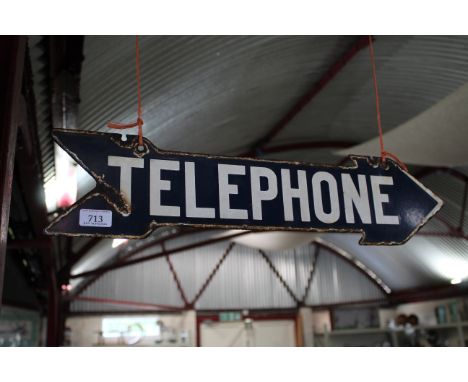 An enamel double sided "Telephone" arrow, approx. 23" x 5&frac12;"