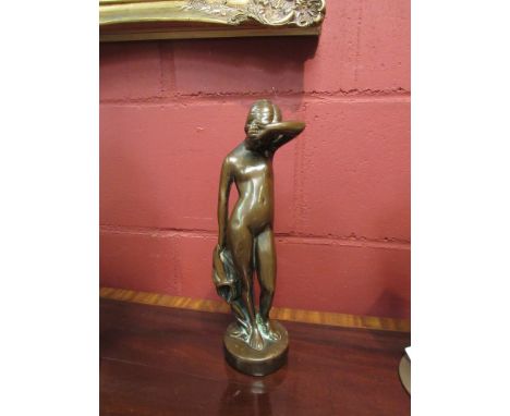 A vintage copper covered statue of a naked girl, 32cm tall