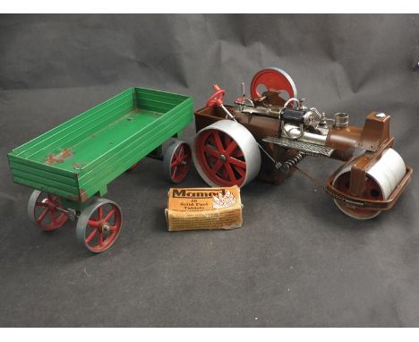 An old smokey spirit traction engine, with Mamod trailer and Mamod accessories