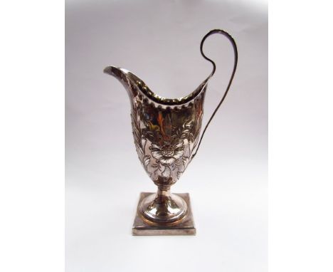 A Hester Bateman silver helmet shaped cream jug on square pedestal base, London 1789,  80g 