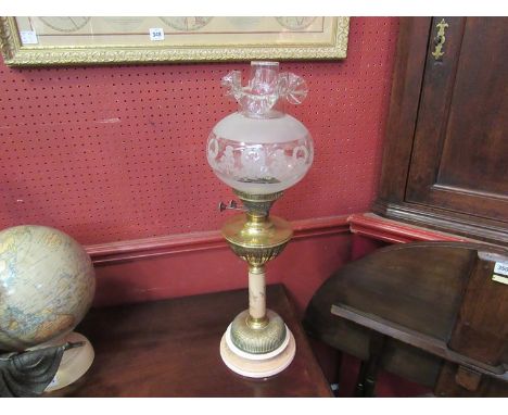 A Victorian oil lamp frosted acid etched shade, frill top, brass fluted reservoir, ceramic column and base
