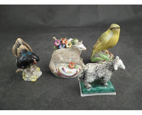 Two models of sheep, one gold anchor mark, mini model of rooster and Royal Worcester wood warbler 