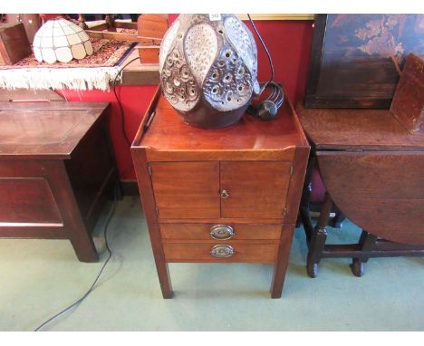 A Georgian step commode single door over two drawers