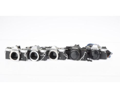 Five Olympus 35mm SLR Camera Bodies, to include an Olympus OM-1, shutter working, missing self-timer lever, an Olympus OM-2 M