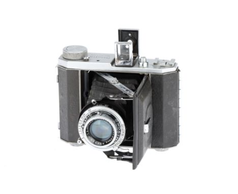 A Semi Minolta III Medium Format Folding Camera, chrome, serial no.12184, shutter requires attention, with Chiyoko Osaka Rokk