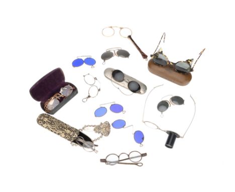 An Interesting Group of Antique Spectacles, including a gilt-brass and tortoiseshell lorgnette, five pince-nez sunglasses, a 