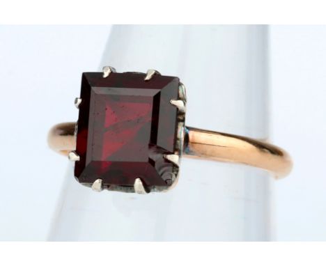 A Pincess Cut Ruby Solitaire Ring, set with approximately 2 ct ruby in platinum and on yellow precious metal shank, unmarked,