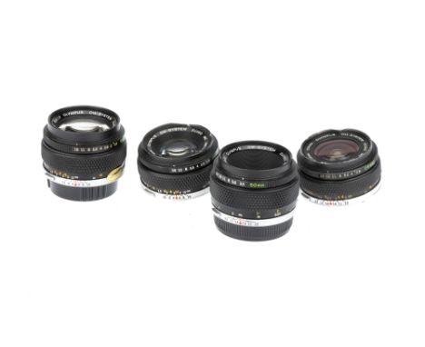 Four Olympus OM Lenses, to include a Zuiko MC Auto-W f/2.8 28mm lens, optics G, some light cleaning marks present, dent to fi