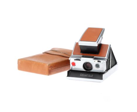 A Polaroid SX-70 Land Camera, chrome, body G, leatherette in G condition, motor winds &amp; shutter fires when empty film pac