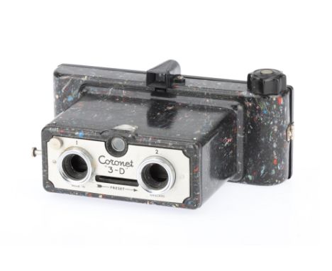 A Coronet 3-D Stereo Camera, end of day bakelite, shutter working,