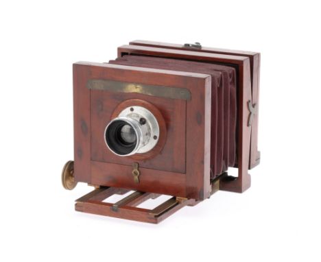 An Early American Optical Co. Mahogany &amp; Brass Camera, body G-VG, stamped 'Amer. Optical Co.', ground glass in good condi