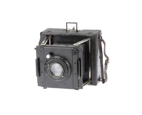 An Unusual Strut Camera, body G, shutter working, marked 'Eastman Kodak Co. U.S.A. Rochester' to rear, with Dallmeyer Press A