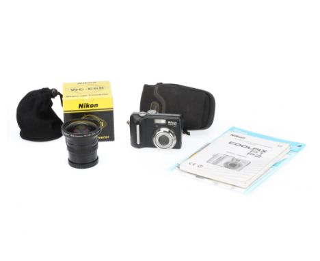 A Nikon P1 Digital Camera, together with a Nikon WC-E68 wideangle converter (a lot)