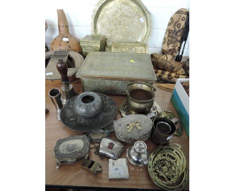 A selection of ornate hand worked brass wares including tea caddy and writers case