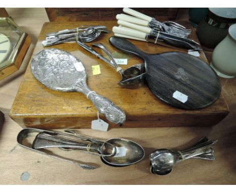 A selection of cutlery and flatware including HM silver