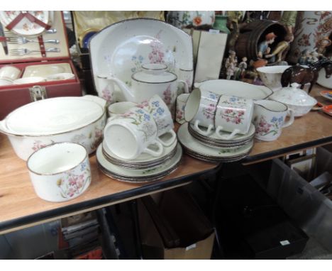 A part tea or dinner service with floral design