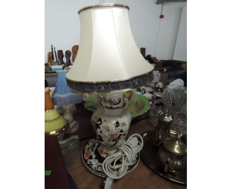 A table lamp and plate by Masons