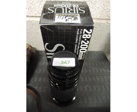 A Sirus MC Auto Zoom 28-200mm lens, in original box