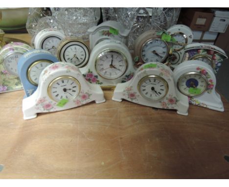 A selection of ceramic mantle clocks including Jasperware