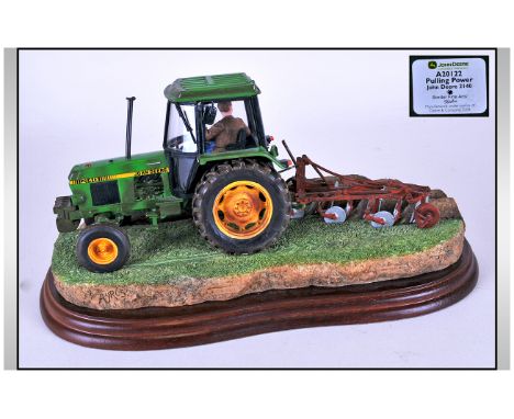 John Deere Border Fine Arts Tractor Model mounted on wooden plaque. Named: Pulling Power, model number A20122.