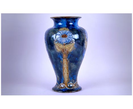 Royal Doulton Art Nouveau Tube Lined Blue Iris Vase. c.1900-1910. Stands 10.5 Inches High.