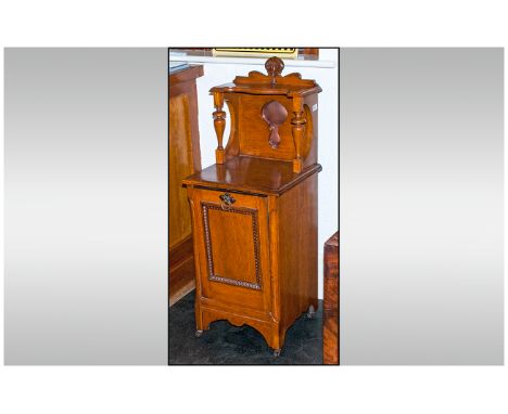 Art Nouveau Oak Standing Fall Down Front Coal Scuttle, with a shaped top shelf with turned side supports. 44 inches in height