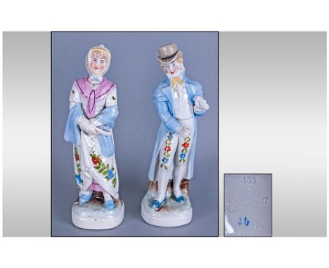 Conta and Boehme Pair of Regency Figures, the lady in flowered white dress with pink fichu, pale blue stole and yellow bonnet