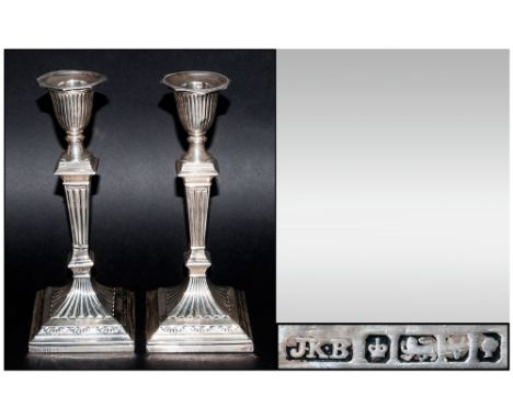 Victorian Silver Pair of Corinthian And Fluted Column Candlesticks. With Detachable Nozzles, Raised on Square Stepped Bases. 