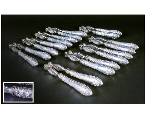 European - Early 20th Century, Rare, Quality Set of Nine Silver Handled Nutcrackers. Silver Mark for 900 to each Nut Cracker 