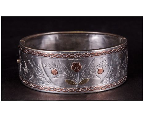 Early 20thC Hinged Silver Bangle, The Front Inlaid In Green And Yellow Gold Of Floral Design, Stamped Sterling