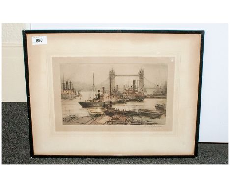 Coloured Etching of Tower Bridge London, with cargo boats in the foreground, busy river scene. Pencil signed by Henry G Walke