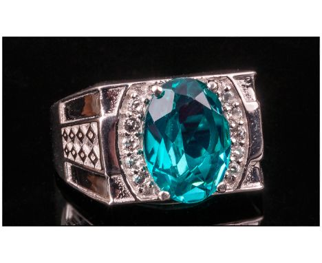 Blue/Green Quartz and White Topaz Ring, 5.25cts in a single, oval cut blue/green quartz edged with .4ct of white topaz set in