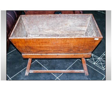 A French Elm Dough Trough, on square tapering leg stand with cross stretchers. Late 19thC. 35 by 26 inches.