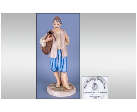 Royal Worcester James Hadley Figure 'The Eastern Watercarrier' modelled by James Hadley. Stands 8'' in height.