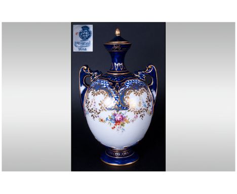 Royal Worcester Hand Painted Two Handled Urn Shaped Vase date 1901. Height 7.75 inches. Over painted to neck and handles. 