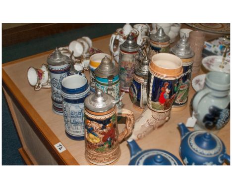Collection of 9  German Stein Tankards including  Mettlach, pewter and glazed ceramic. Various heights.
