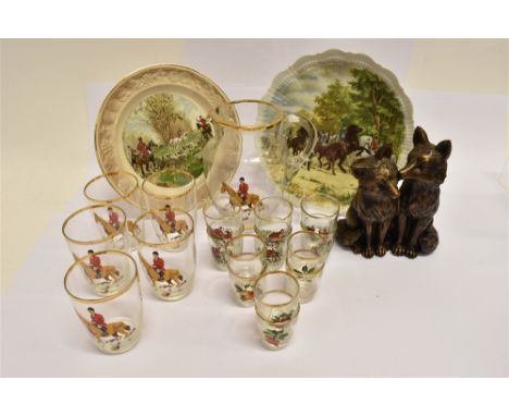 A WATER SET comprising a glass jug and five tumblers with gilt rims and huntsman and hounds decoration; six similar tot glass