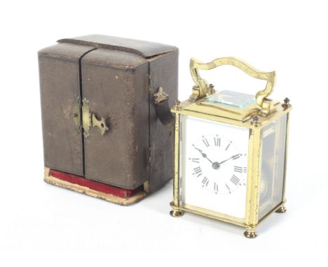 A French 20th century gilt metal five glass carriage clock. With travelling leather case, white dial, Roman numerals and beve